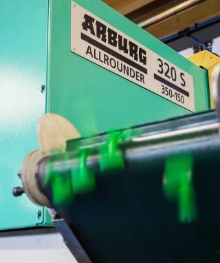Arburg injection moulding machine in use.jpg